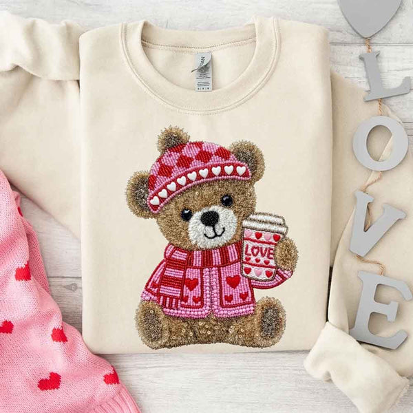 May include a crewneck sweatshirt with a Love Coffee Teddy Valentine design featuring a furry-look 3D printed effect.