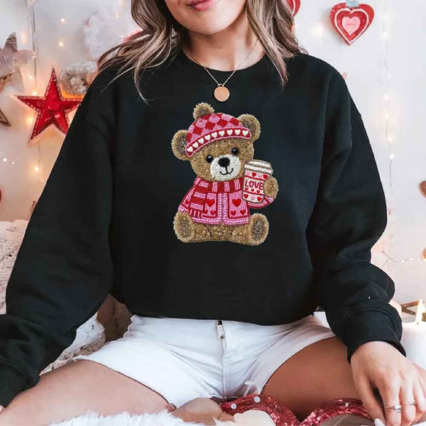 May include a crewneck sweatshirt with a Love Coffee Teddy Valentine design featuring a furry-look 3D printed effect.