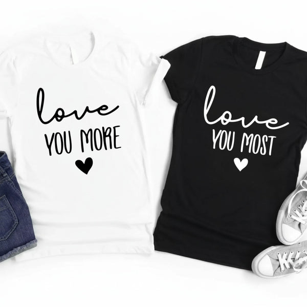 May include a soft unisex T-shirt with the phrase Love You Most/More printed on the front in a clean, simple design.