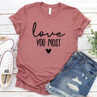 May include a soft unisex T-shirt with the phrase Love You Most printed on the front in a clean, simple design.