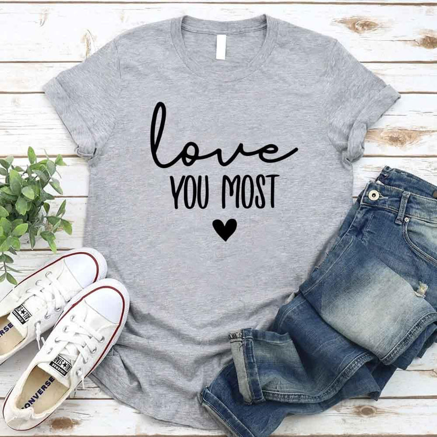 May include a soft unisex T-shirt with the phrase Love You Most printed on the front in a clean, simple design.