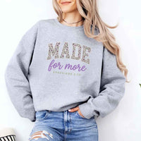 Cozy Christian encouragement sweatshirt featuring a relaxed fit, soft fabric, and inspirational graphic design.