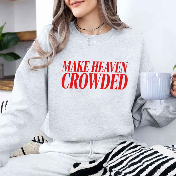 May include Make Heaven Crowded sweatshirt with religious inspiration graphic design and relaxed unisex fit