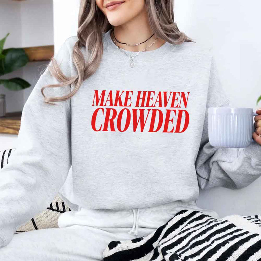 May include Make Heaven Crowded sweatshirt with religious inspiration graphic design and relaxed unisex fit