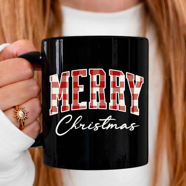 May include a ceramic mug with a buffalo plaid “Merry Christmas” design in traditional red and black tones.