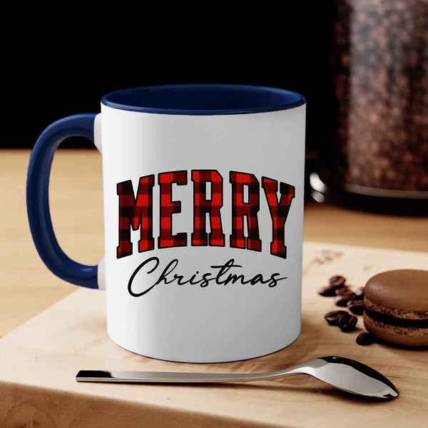 May include a ceramic mug with a buffalo plaid “Merry Christmas” design in traditional red and black tones.