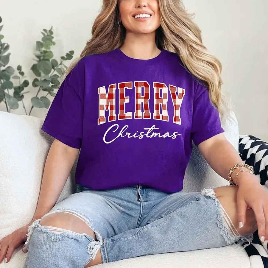 May include a unisex T-shirt featuring a buffalo plaid “Merry Christmas” design suitable for matching holiday outfits.