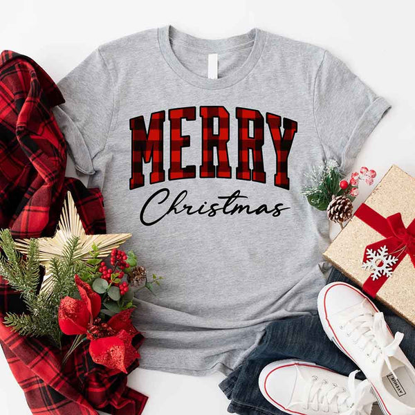 May include a unisex T-shirt featuring a buffalo plaid “Merry Christmas” design suitable for matching holiday outfits.