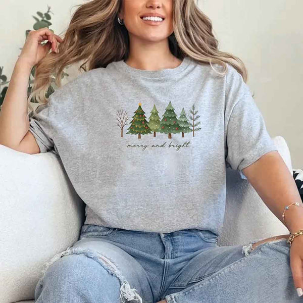May include women’s holiday Christmas shirt with Merry & Bright tree design, festive tee for holiday parties and gatherings.