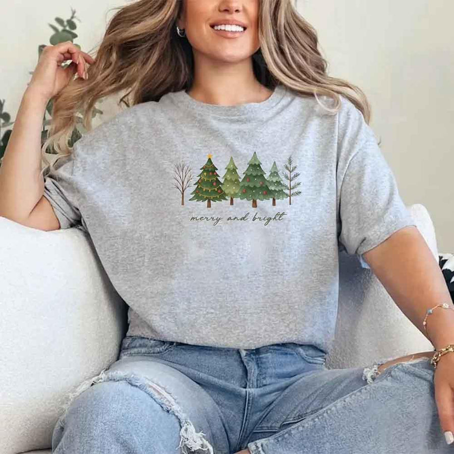 May include women’s holiday Christmas shirt with Merry & Bright tree design, festive tee for holiday parties and gatherings.