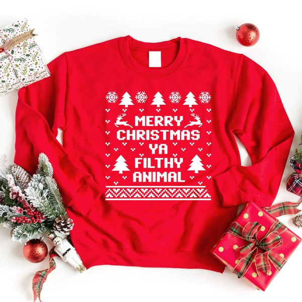 May include a Merry Christmas Ya Filthy Animal sweatshirt laid flat to show the holiday print clearly on the front.
