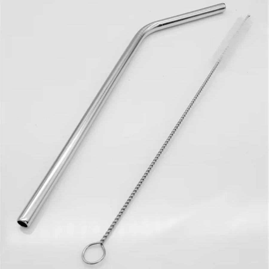 Reusable metal straw with angled tip and cleaning brush on white background