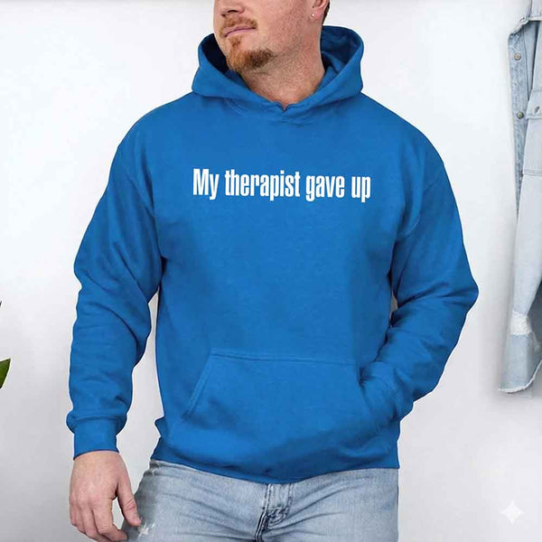 May include a soft fleece hoodie with the humorous phrase “My Therapist Gave Up” printed on the front.