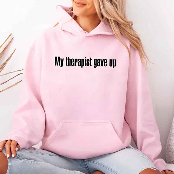 May include a soft fleece hoodie with the humorous phrase “My Therapist Gave Up” printed on the front.