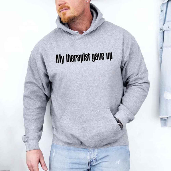 May include a soft fleece hoodie with the humorous phrase “My Therapist Gave Up” printed on the front.