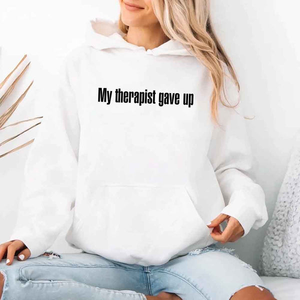 May include a soft fleece hoodie with the humorous phrase “My Therapist Gave Up” printed on the front.