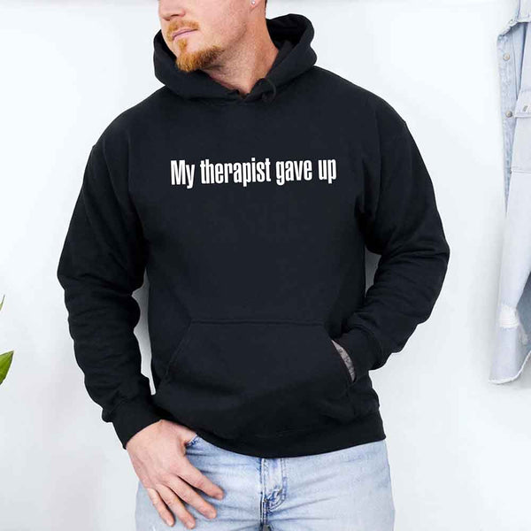 May include a soft fleece hoodie with the humorous phrase “My Therapist Gave Up” printed on the front.