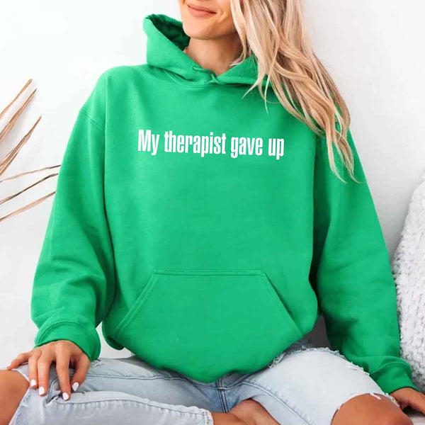 May include a soft fleece hoodie with the humorous phrase “My Therapist Gave Up” printed on the front.