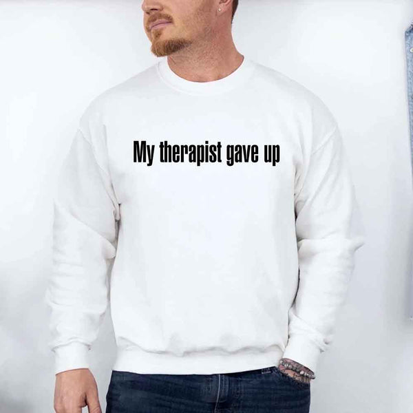 May include a crew neck sweatshirt with the humorous phrase “My Therapist Gave Up” printed on the front.