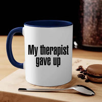 May include a ceramic coffee mug with the printed phrase My Therapist Gave Up in a clean, bold font.