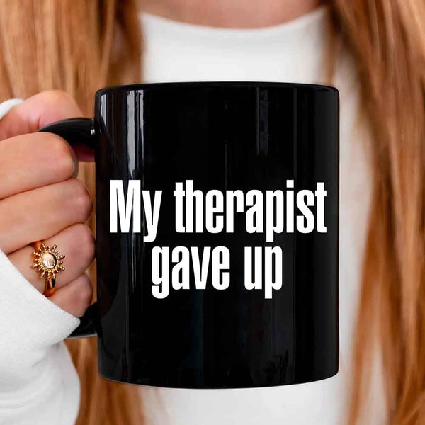 May include a ceramic coffee mug with the printed phrase My Therapist Gave Up in a clean, bold font.