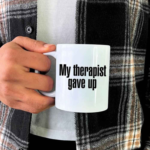 May include a ceramic coffee mug with the printed phrase My Therapist Gave Up in a clean, bold font.