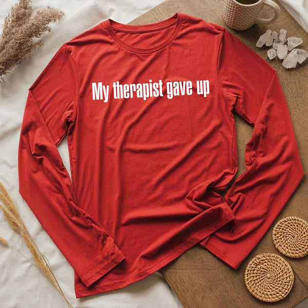 May include a long sleeve t-shirt with the phrase “My Therapist Gave Up” printed across the front.