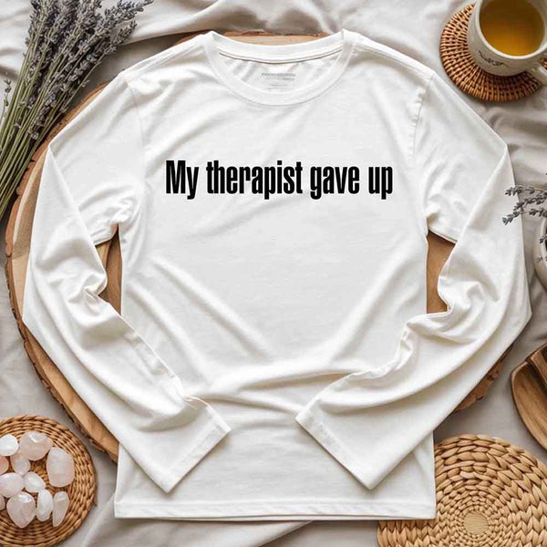 May include a long sleeve t-shirt with the phrase “My Therapist Gave Up” printed across the front.