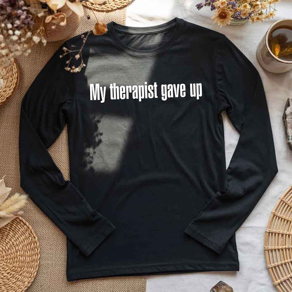 May include a long sleeve t-shirt with the phrase “My Therapist Gave Up” printed across the front.
