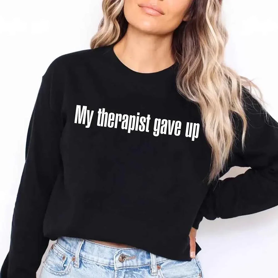 May include a long sleeve t-shirt with the phrase “My Therapist Gave Up” printed across the front.