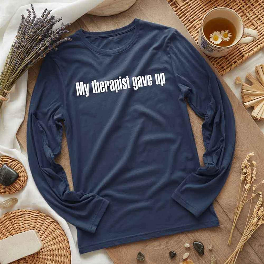 May include a long sleeve t-shirt with the phrase “My Therapist Gave Up” printed across the front.