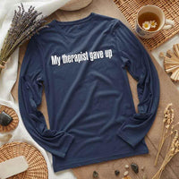 May include a long sleeve t-shirt with the phrase “My Therapist Gave Up” printed across the front.