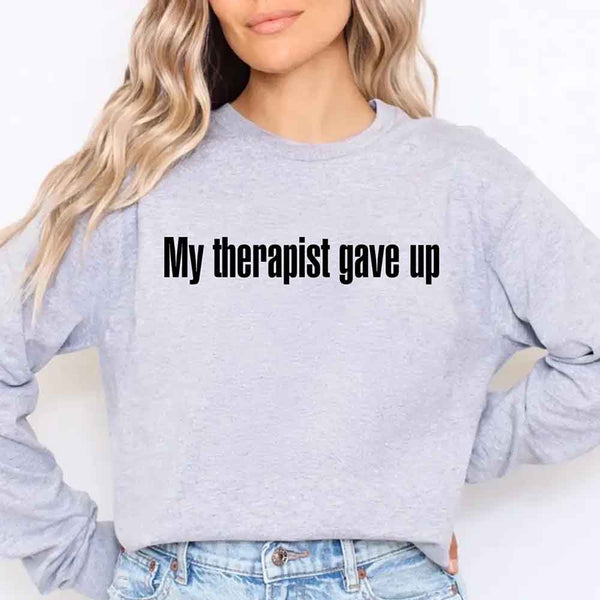 May include a long sleeve t-shirt with the phrase “My Therapist Gave Up” printed across the front.