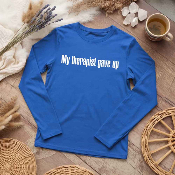May include a long sleeve t-shirt with the phrase “My Therapist Gave Up” printed across the front.
