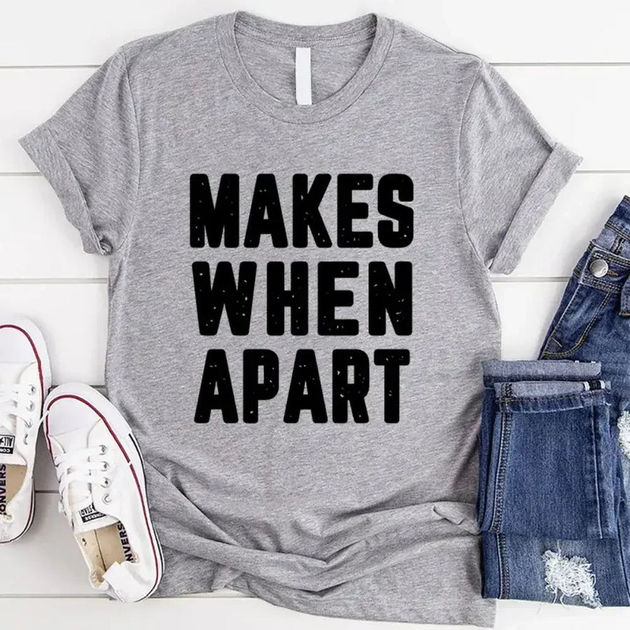 May include a pair of matching couple t-shirts featuring the phrase “Nothing Makes Sense When We’re Apart” in complementary designs. Each shirt displays part of the message, creating a complete look when worn together, symbolizing connection, love, and togetherness.