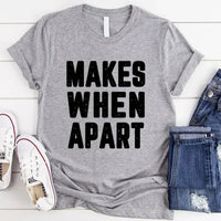 May include a pair of matching couple t-shirts featuring the phrase “Nothing Makes Sense When We’re Apart” in complementary designs. Each shirt displays part of the message, creating a complete look when worn together, symbolizing connection, love, and togetherness.