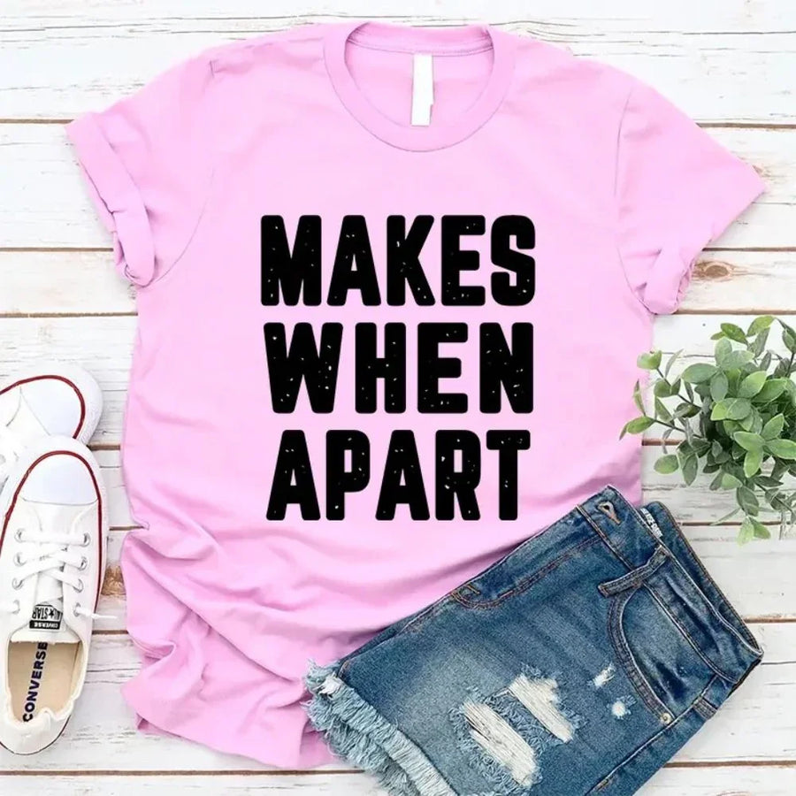 May include a pair of matching couple t-shirts featuring the phrase “Nothing Makes Sense When We’re Apart” in complementary designs. Each shirt displays part of the message, creating a complete look when worn together, symbolizing connection, love, and togetherness.