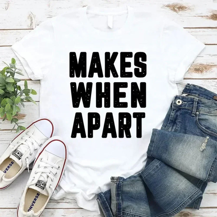 May include a pair of matching couple t-shirts featuring the phrase “Nothing Makes Sense When We’re Apart” in complementary designs. Each shirt displays part of the message, creating a complete look when worn together, symbolizing connection, love, and togetherness.