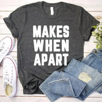 May include a pair of matching couple t-shirts featuring the phrase “Nothing Makes Sense When We’re Apart” in complementary designs. Each shirt displays part of the message, creating a complete look when worn together, symbolizing connection, love, and togetherness.