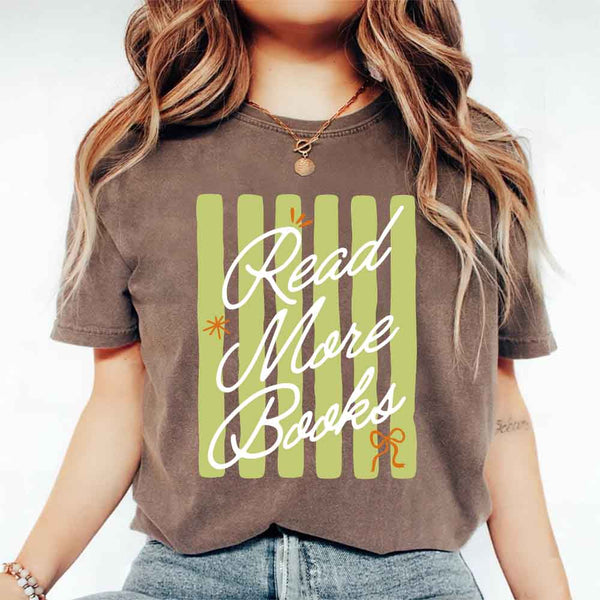 May include Read More Books Comfort Colors t-shirt with book lover graphic, relaxed unisex fit, and garment-dyed cotton
