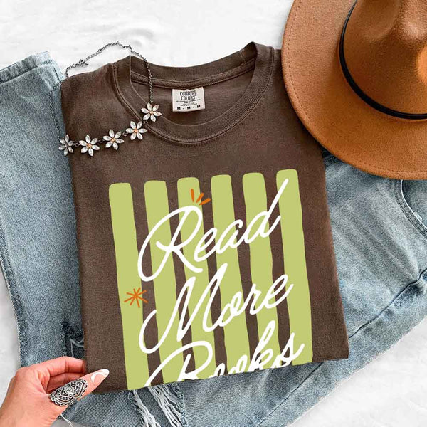 May include Read More Books Comfort Colors t-shirt with book lover graphic, relaxed unisex fit, and garment-dyed cotton