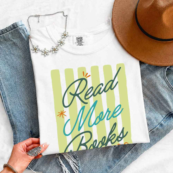 May include Read More Books Comfort Colors t-shirt with book lover graphic, relaxed unisex fit, and garment-dyed cotton