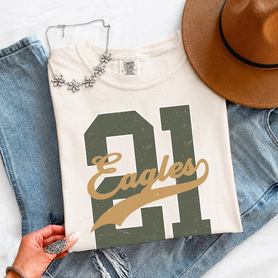May include a Retro College Football Comfort Colors T-Shirt featuring a vintage-inspired athletic graphic, collegiate lettering, and classic game-day style.