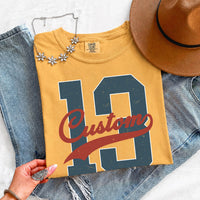 May include a Retro College Football Comfort Colors T-Shirt featuring a vintage-inspired athletic graphic, collegiate lettering, and classic game-day style.