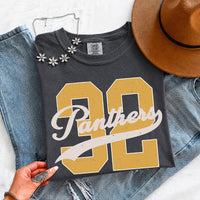 May include a Retro College Football Comfort Colors T-Shirt featuring a vintage-inspired athletic graphic, collegiate lettering, and classic game-day style.