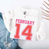 May include a midweight crewneck sweatshirt with a retro FEBRUARY 14 graphic for Valentine’s Day.