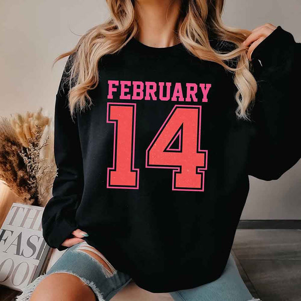 May include a midweight crewneck sweatshirt with a retro FEBRUARY 14 graphic for Valentine’s Day.