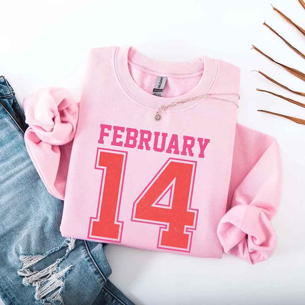 May include a midweight crewneck sweatshirt with a retro FEBRUARY 14 graphic for Valentine’s Day.