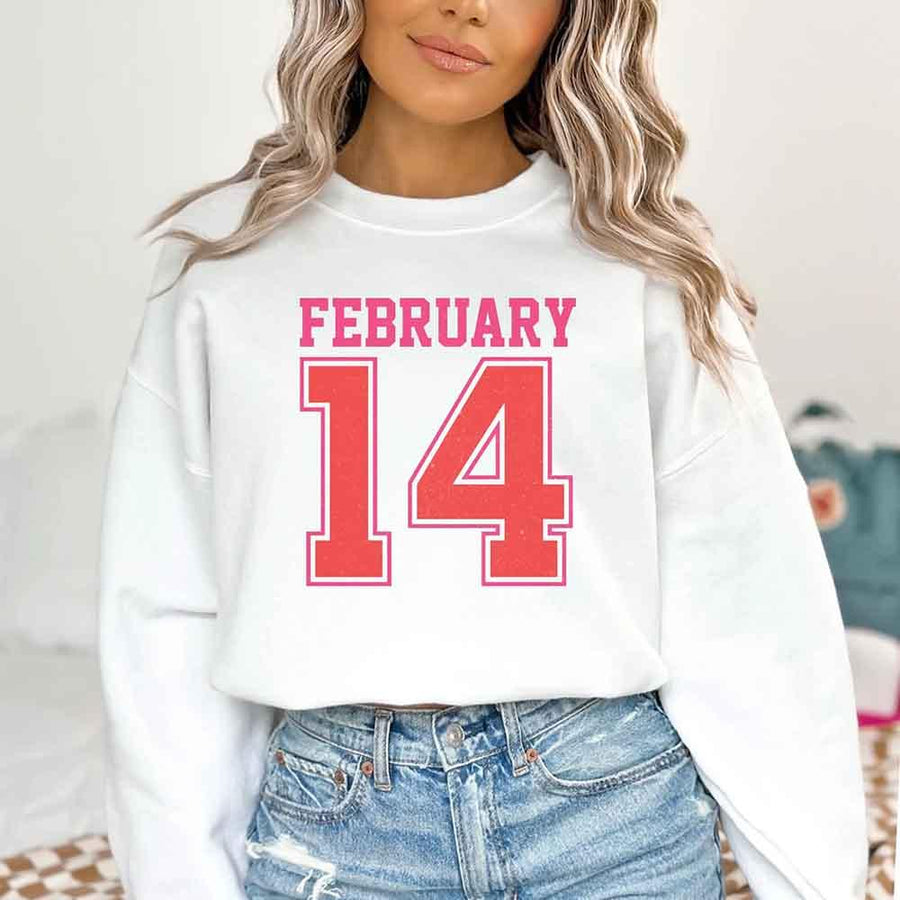 May include a midweight crewneck sweatshirt with a retro FEBRUARY 14 graphic for Valentine’s Day.