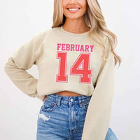 May include a midweight crewneck sweatshirt with a retro FEBRUARY 14 graphic for Valentine’s Day.